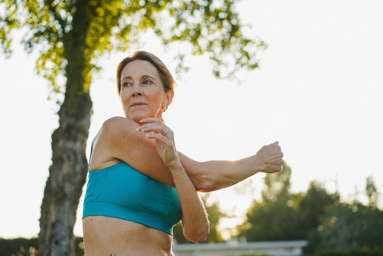 Woman running outdoors in athletic wear